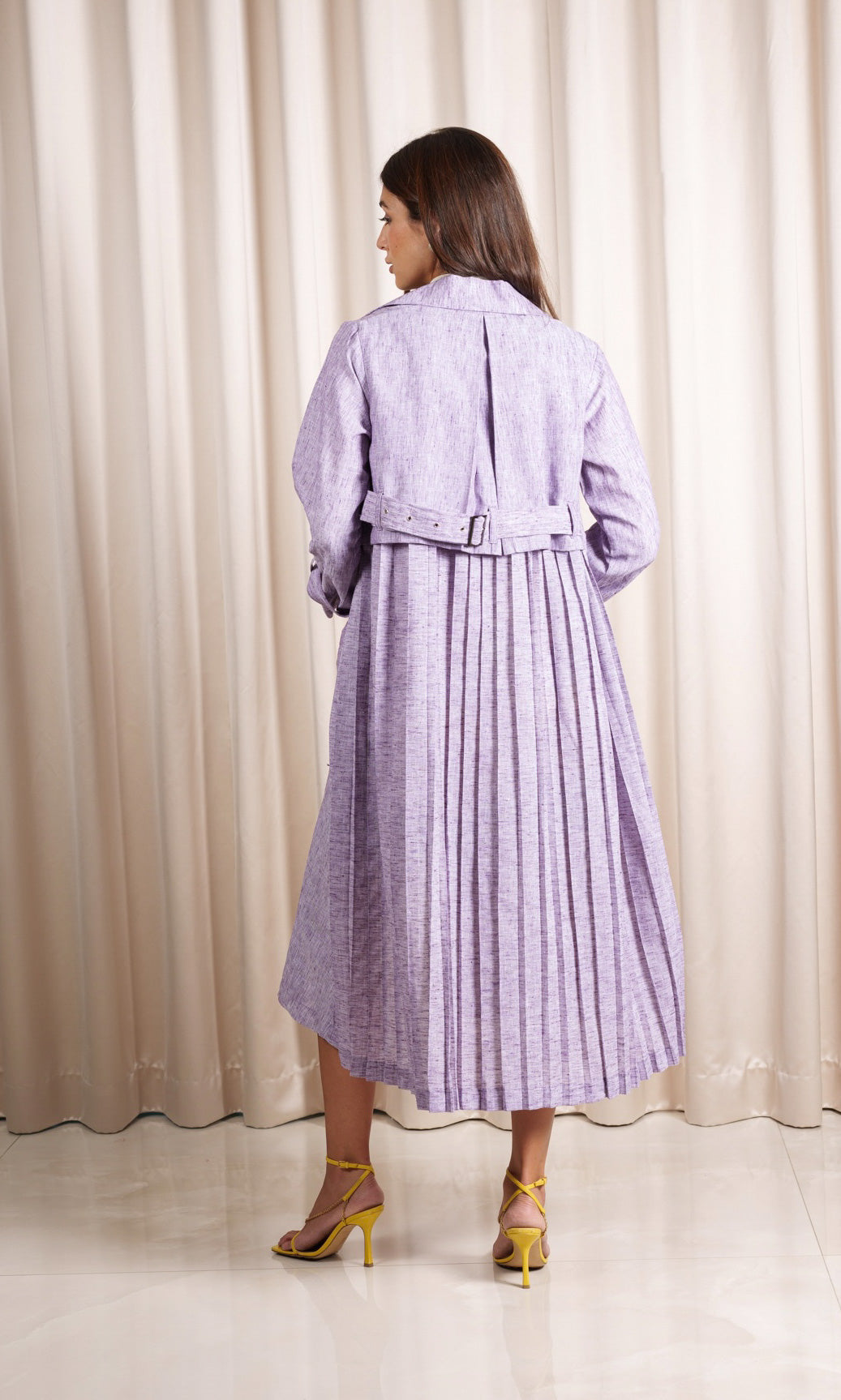 Model wears lilac linen trench coat